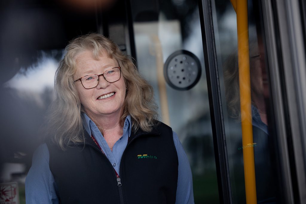 Smiling bus operator